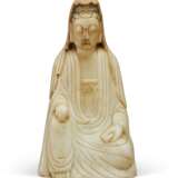A PALE BEIGE SOAPSTONE FIGURE OF SEATED GUANYIN - photo 1