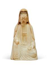 A PALE BEIGE SOAPSTONE FIGURE OF SEATED GUANYIN