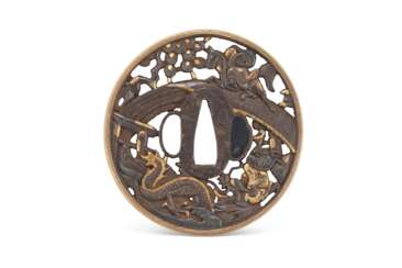 AN IRON TSUBA WITH GOLD AND SILVER NUNOME ZOGAN (DAMASCENING)
