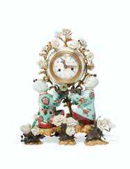 A LOUIS XV ORMOLU AND PATINATED BRONZE-MOUNTED CHINESE AND CHANTILLY PORCELAIN MANTEL CLOCK