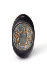 A ROMAN OBSIDIAN AND GILT GLASS FINGER RING