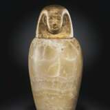 AN EGYPTIAN ALABASTER CANOPIC JAR - фото 1