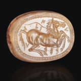 A GREEK BANDED CARNELIAN SCARABOID WITH A HORSE - фото 1