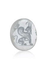 A GRECO-PERSIAN GRAY CHALCEDONY SCARABOID WITH A BEARDED MALE GOAT-SPHINX