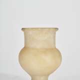 AN EGYPTIAN ALABASTER FOOTED JAR - photo 1