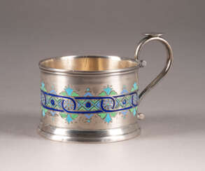 A SILVER AND CHAMPLEVÉ ENAMEL TEAGLASS HOLDER