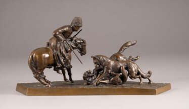 A BRONZE GROUP OF A WOLF HUNT