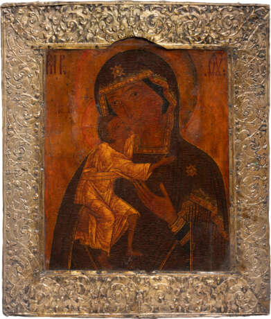 AN ICON SHOWING THE FEODOROVSKAYA MOTHER OF GOD WITH SILVER-GILT BASMA - photo 1