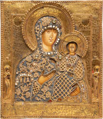 A FINE ICON SHOWING THE SMOLENSKAYA MOTHER OF GOD WITH AN EMBROIDERED OKLAD