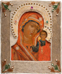 AN ICON SHOWING THE KAZANSKAYA MOTHER OF GOD WITH EMBROIDERED RIZA