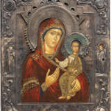 AN ICON SHOWING THE SMOLENSKAYA MOTHER OF GOD WITH SILVER RIZA - photo 1