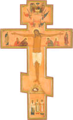 A LARGE CRUCIFIX SHOWING THE CRUCIFIED CHRIST AND SELECTED SAINTS