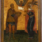 A MONUMENTAL ICON SHOWING ST. JOHN THE WARRIOR AND ST. PARASKEVA FROM A CHURCH ICONOSTASIS - photo 1