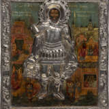AN ICON SHOWING ST. JOHN THE WARRIOR WITH A SILVER-GILT BASMA - photo 1