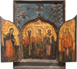 A LARGE TRIPTYCH SHOWING STS. PANTELEIMON, BASIL THE GREAT AND ATHANASIOS FLANKED BY MARINA BEATING THE DEVIL AND CHARALAMPOS