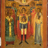 A LARGE ICON SHOWING THE ARCHANGEL MICHAEL AND FOUR PATRON SAINTS OF ANIMALS: FLORUS, LAURUS, MODEST AND BLAISE - фото 1