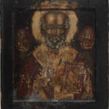 A VERY FINE ICON SHOWING ST. NICHOLAS OF MYRA WITH A SILVER-GILT OKLAD - photo 2