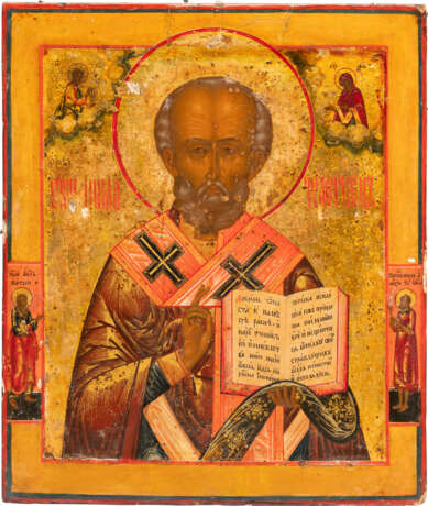 A LARGE ICON SHOWING ST. NICHOLAS OF MYRA WITH A SILVER OKLAD WITHIN KYOT - photo 2
