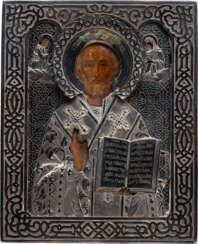 A SMALL ICON SHOWING ST. NICHOLAS OF MYRA WITH A SILVER OKLAD