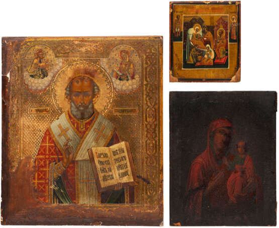 THREE ICONS: A MINIATURE ICON SHOWING THE NATIVITY OF THE MOTHER OF GOD, THE SMOLENSKAYA MOTHER OF GOD AND ST. NICHOLAS OF MYRA - photo 1