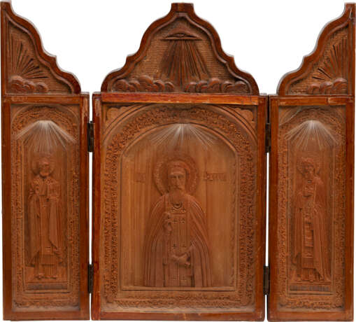 A CARVED TRIPTYCH SHOWING ST. SERGEY OF RADONEZH, STS. NICHOLAS OF MYRA AND NIKON - photo 1