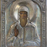 A SMALL ICON SHOWING ST. ALEXIUS, METROPOLITAN OF MOSCOW WITH A SILVER OKLAD - фото 1