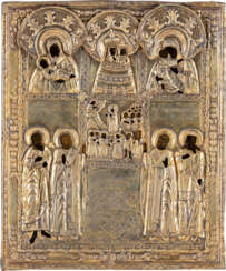 A RARE MULTI-PARTITE ICON SHOWING IMAGES OF THE MOTHER OF GOD AND SELECTED SAINTS WITH A SILVER-GILT OKLAD