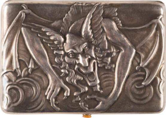 A SILVER CIGARETTE CASE SHOWING MEPHISTO - фото 1