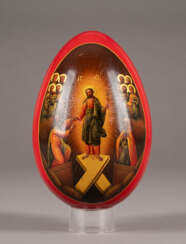 A LARGE PAPIER-MACHÉ AND LACQUER EASTER EGG SHOWING THE DESCENT INTO HELL AND AN ARCHITECTURAL VIEW OF MOSCOW