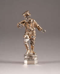 A SILVER MODEL OF A DANCING PEASANT