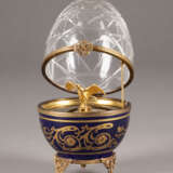 A EGG-SHAPED SILVER-GILT, CUT-GLASS AND PORCELAIN BOX WITH EAGLE WITHIN ORIGINAL FITTED CASE - photo 2