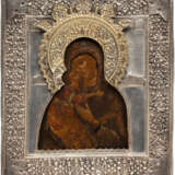 AN ICON SHOWING THE VLADIMIRSKAYA-VOLOKOLAMSKAYA MOTHER OF GOD WITH A SILVER RIZA - photo 1