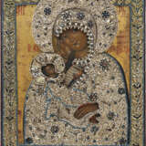 A LARGE ICON SHOWING THE MOTHER OF GOD 'SOOTHE MY SORROW' WITH AN EMBROIDERED OKLAD - фото 1