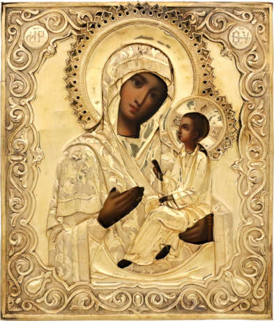 AN ICON SHOWING THE TIKHVINSKAYA MOTHER OF GOD WITH A SILVER-GILT OKLAD - фото 1