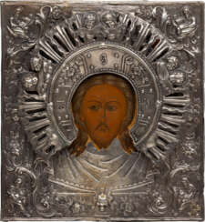 A SMALL ICON SHOWING THE MANDYLION WITH A SILVER OKLAD
