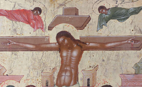 AN ICON SHOWING THE CRUCIFIXION OF CHRIST - photo 2