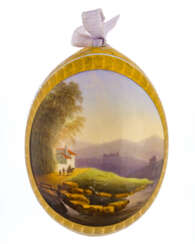 FINELY PAINTED PORCELAIN EASTER EGG WITH WALKING IN A LANDSCAPE