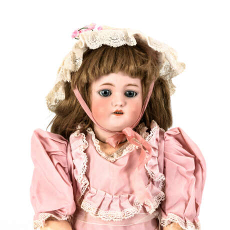 Puppenmädchen mit rosa Kleid. Simon & Halbig. - Foto 1