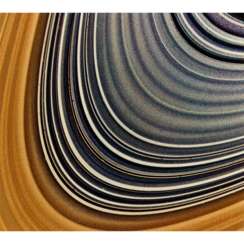TWO PHOTOGRAPHS OF THE RINGS OF SATURN