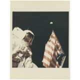 ASTRONAUT HARRISON SCHMITT WITH THE EARTH ABOVE THE US FLAG, DECEMBER 7-19, 1972 - photo 2