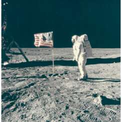 BUZZ ALDRIN AND THE AMERICAN FLAG ON THE SEA OF TRANQUILLITY