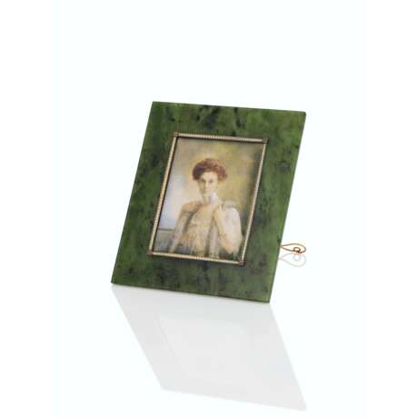 A GOLD-MOUNTED NEPHRITE FRAME WITH PORTRAIT MINIATURE - photo 1