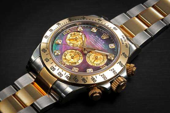 ROLEX, DAYTONA REF. 116523, A STEEL AND GOLD AUTOMATIC CHRONOGRAPH WITH MOTHER OF PEARL DIAL AND DIAMONDS - photo 1