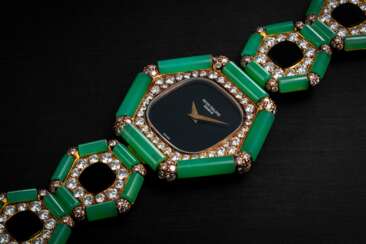 PATEK PHILIPPE REF. 4364, A YELLOW GOLD DIAMOND ONYX & CHRYSOPRASE WRISTWATCH, EARRING, AND RING SUITE 