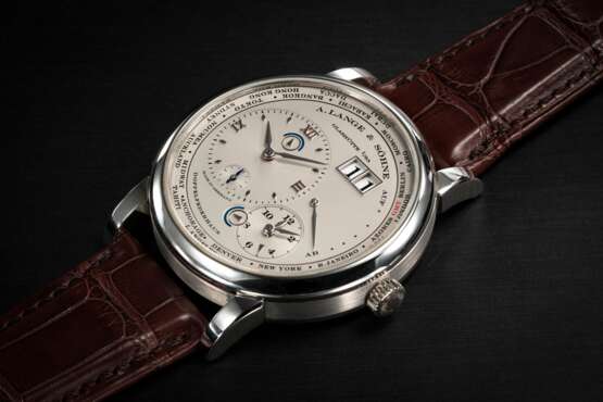 A. LANGE & SÖHNE, LANGE 1 TIME ZONE REF. 116.025, A PLATINUM MANUAL-WINDING WORLD TIME WRISTWATCH - photo 1