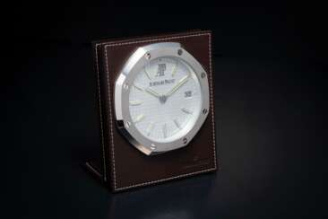 AUDEMARS PIGUET, ROYAL OAK TABLE CLOCK, A STEEL AND LEATHER MECHANICAL CLOCK