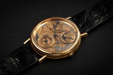 BREGUET, CLASSIQUE REF. 3135BA/00/26, A GOLD OPENWORKED DIAL WRISTWATCH WITH MOONPHASE