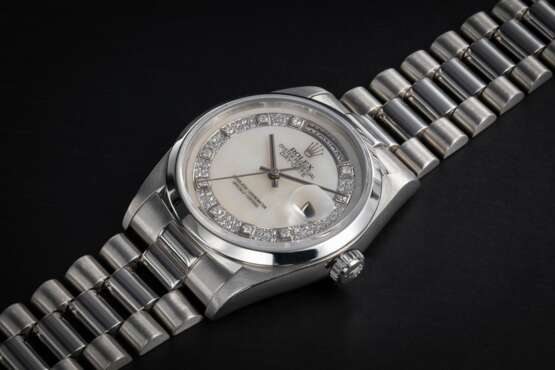 ROLEX, DAY-DATE REF. 18206, A PLATINUM AND DIAMOND WRISTWATCH WITH MOTHER OF PEARL DIAL - photo 1