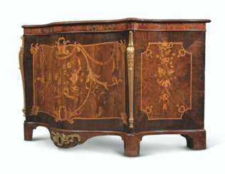 A GEORGE III ORMOLU-MOUNTED AND PARCEL-GILT INDIAN ROSEWOOD, YEWWOOD AND MARQUETRY SERPENTINE COMMODE