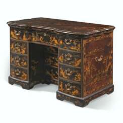 A CHINESE EXPORT BLACK AND GILT-LACQUERED KNEEHOLE DESK OR DRESSING-TABLE